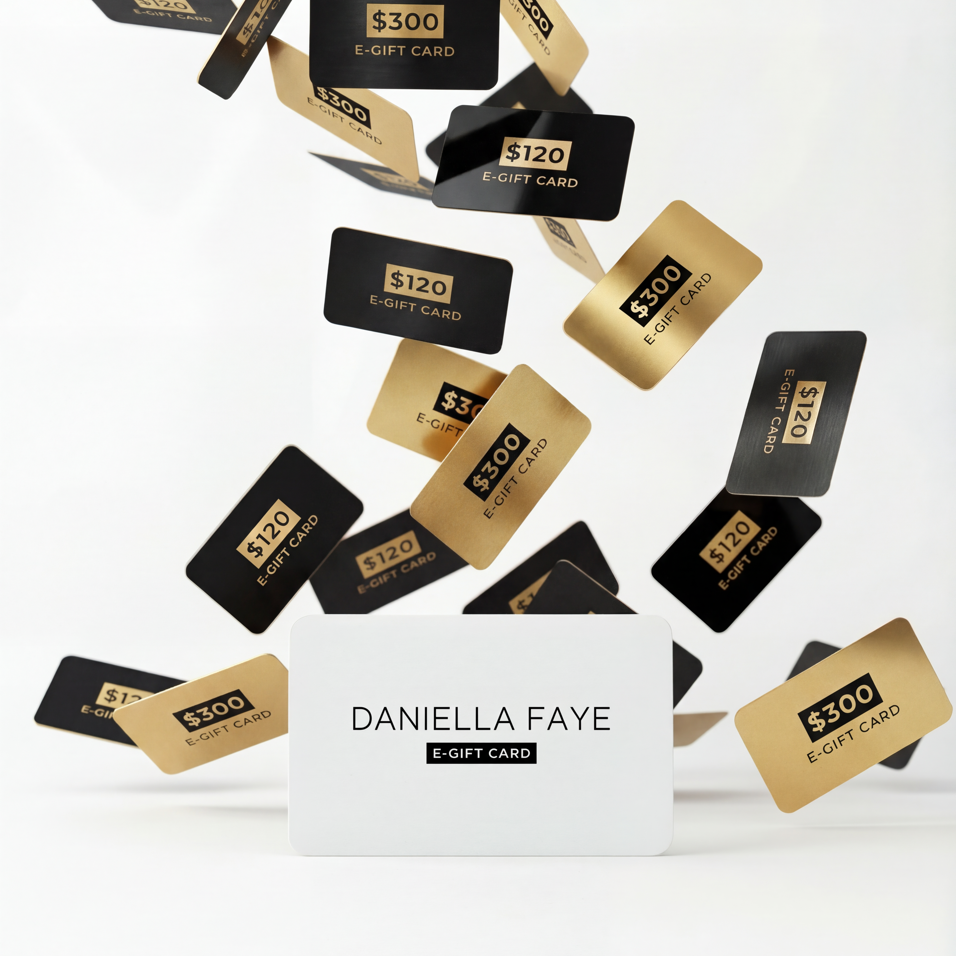 Various gift cards with different values falling towards a Daniella Faye gift card on a white background.